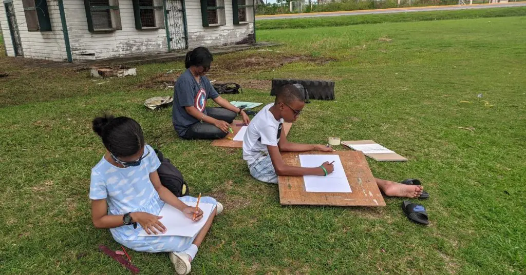 Students Drawing Outdoors 