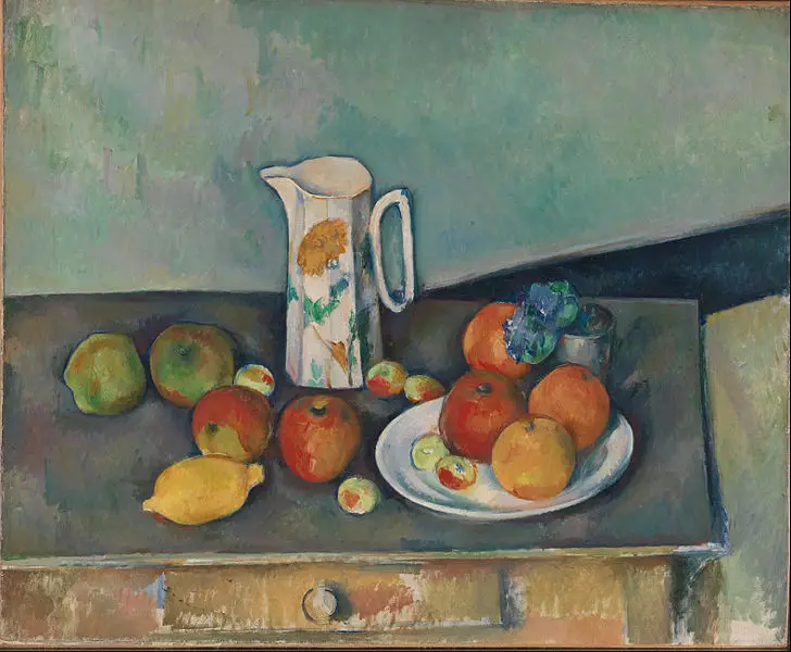 Nature morte, pot à lait et fruits sur une table by Paul Cézanne