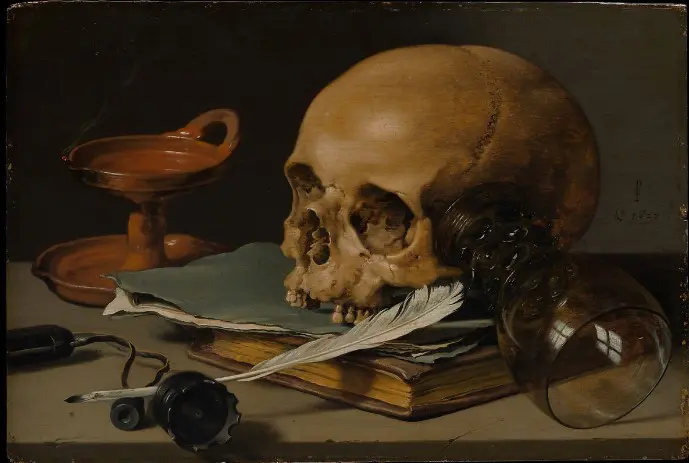 Still Life with a Skull and a Writing Quill by Pieter Claesz 
