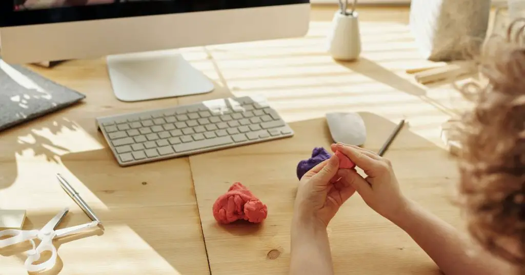 A child working with play dough