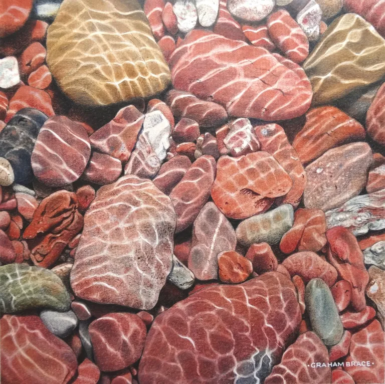 pebbles in a stream by Graham Brace